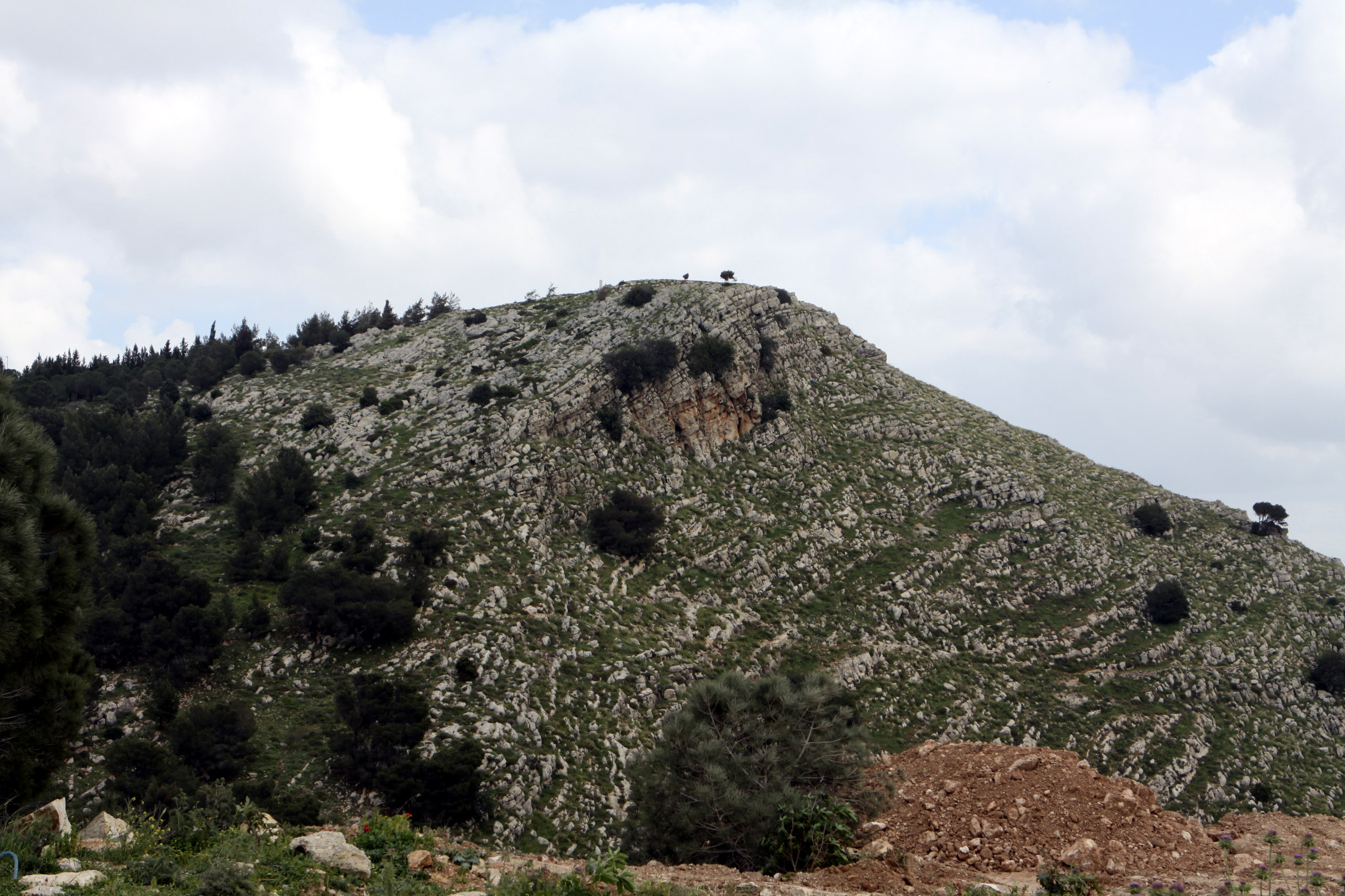 Mount of Precipice. According to the local tradition, this is the mount where ruffians tried to push Jesus over the cliff. It is not a right-angled cliff, but it is precipitous enough for anybody falling to suffer from a serious injury or death.